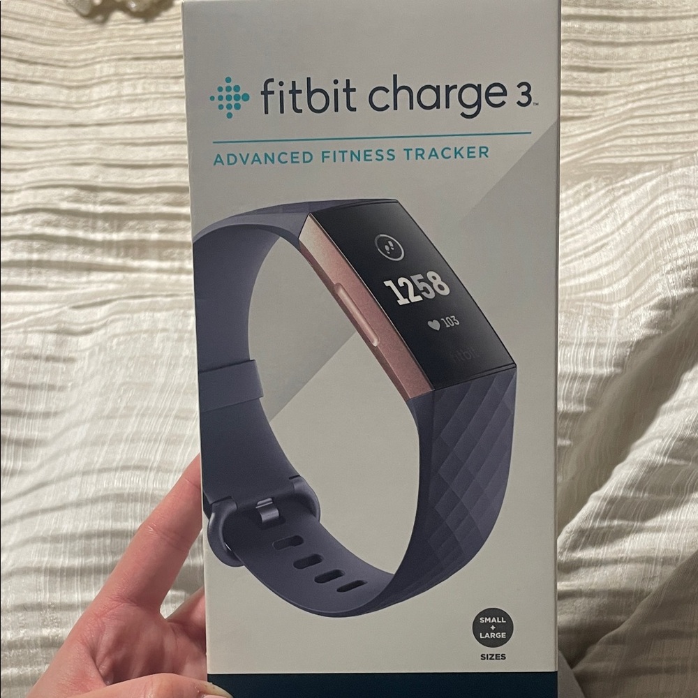 Fitbit Charge 3 Fitness Tracker - Blue grey band and Rose Gold aluminum tracker